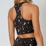Top v barvi breskve z leopardjim vzorcem